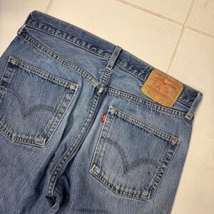 Vintage Levi's 501 Distressed Straight Leg Jeans — Medium Wash -Size 33 x 34